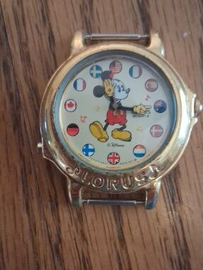 Vintage Disney Gold Tone Mickey Mouse Dial Watch with Multicolor Flag Accents